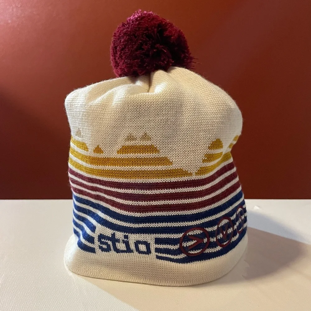 Stio Cream Knit Pom Beanie with Maroon Pom and Multicolor Stripes